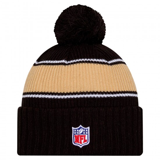 New Orleans Saints New Era Black 2024 Sideline Sport Cuffed Knit Hat with Pom