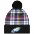 Philadelphia Eagles New Era Black 2024 NFL Crucial Catch Cuffed Knit Hat with Pom