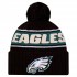 Philadelphia Eagles New Era Black 2024 Sideline Cuffed Knit Hat with Pom