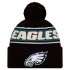 Philadelphia Eagles New Era Black 2024-25 Sideline Cuffed Knit Hat with Pom