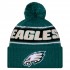 Philadelphia Eagles New Era Midnight Green 2024 Sideline Cuffed Knit Hat with Pom