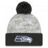 Seattle Seahawks  New Era White-Graphite 2024 Salute To Service Digital Camo Cuffed Knit Hat with Pom