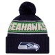 Seattle Seahawks New Era College Navy 2024 Sideline Cuffed Knit Hat with Pom