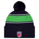 Seattle Seahawks New Era College Navy 2024 Sideline Cuffed Knit Hat with Pom